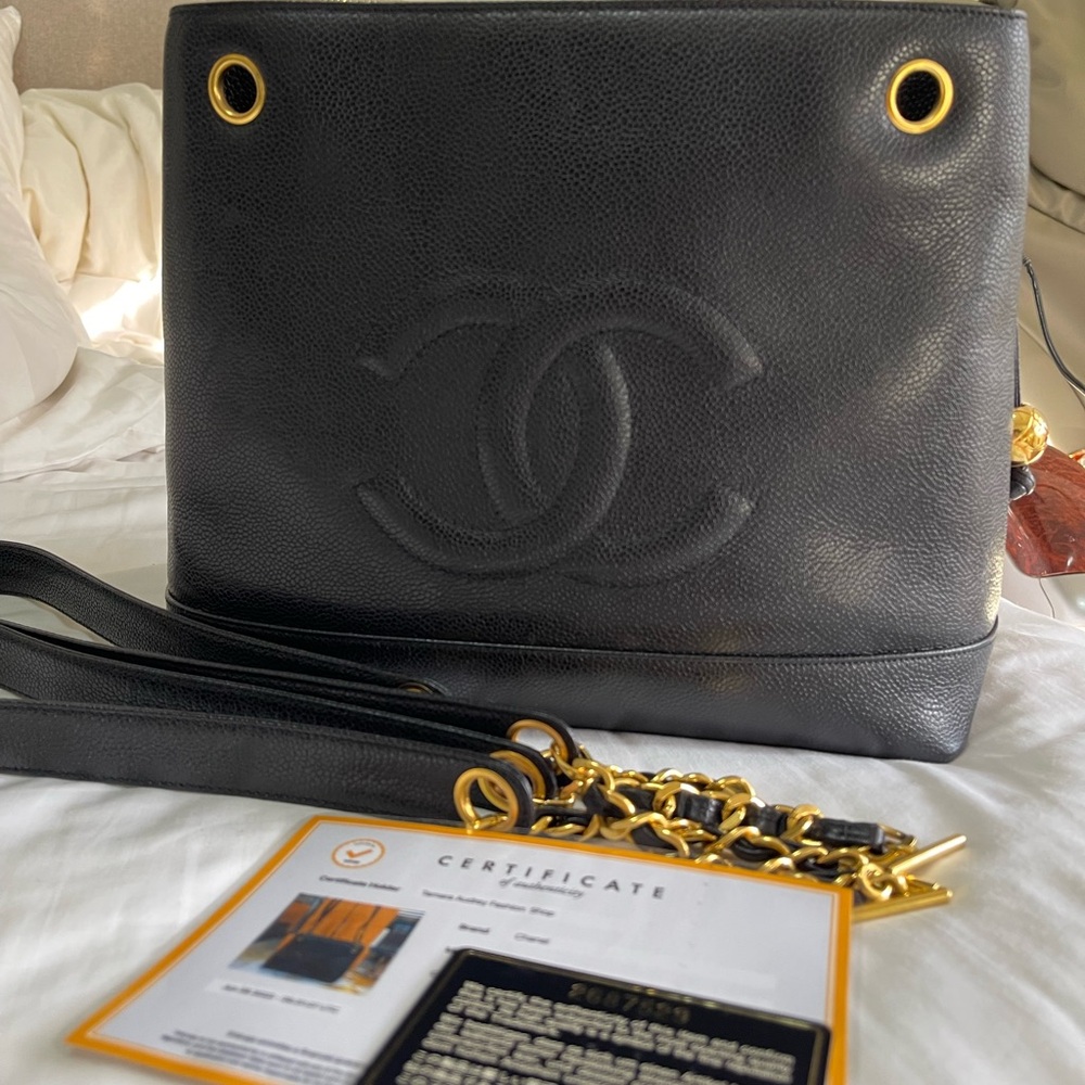 Chanel Black and Gold Shoulder Bag with Iconic CC Logo